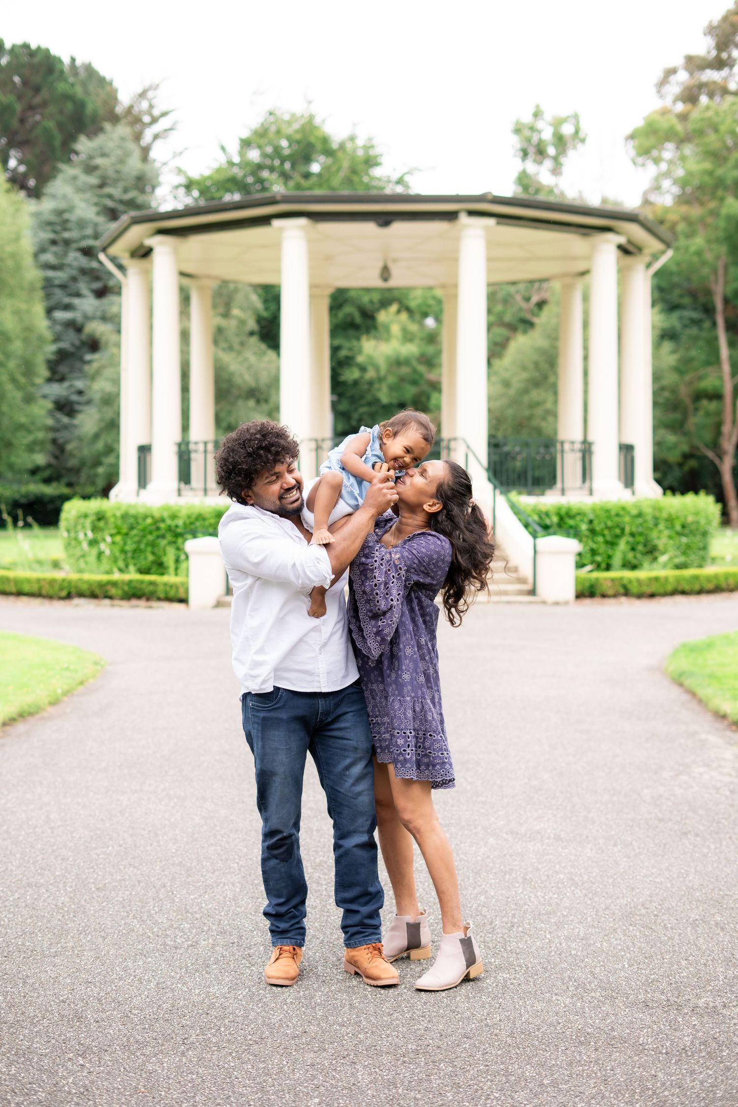 family of 3 at a park