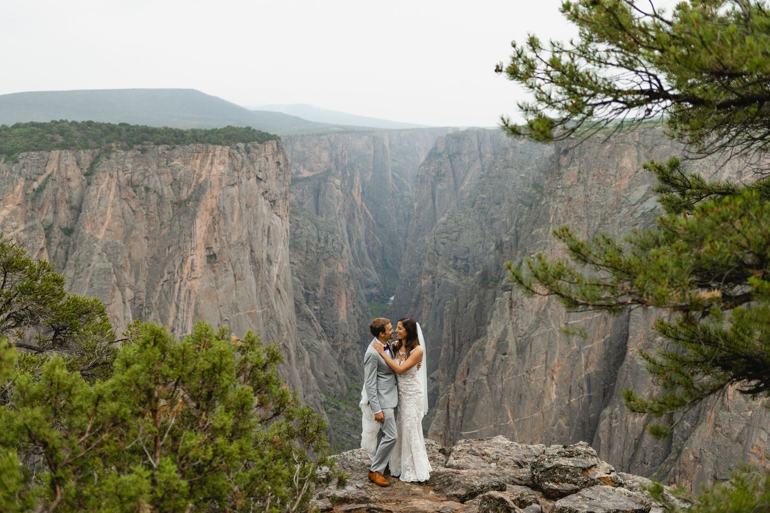married couple kissing at Black Canyon of Gunnison during their Colorado elopement