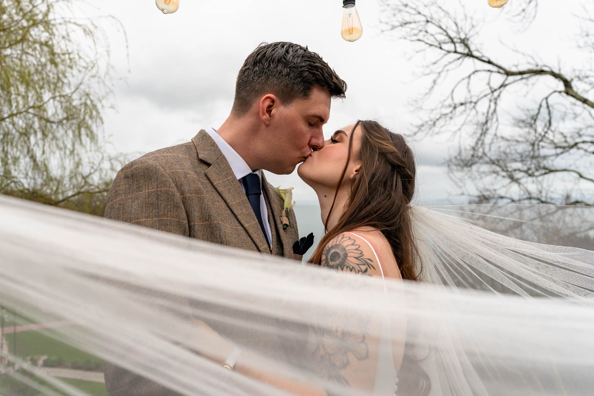 Beautiful veil photograph with Bride and Groom at Sandy Cove Wedding.