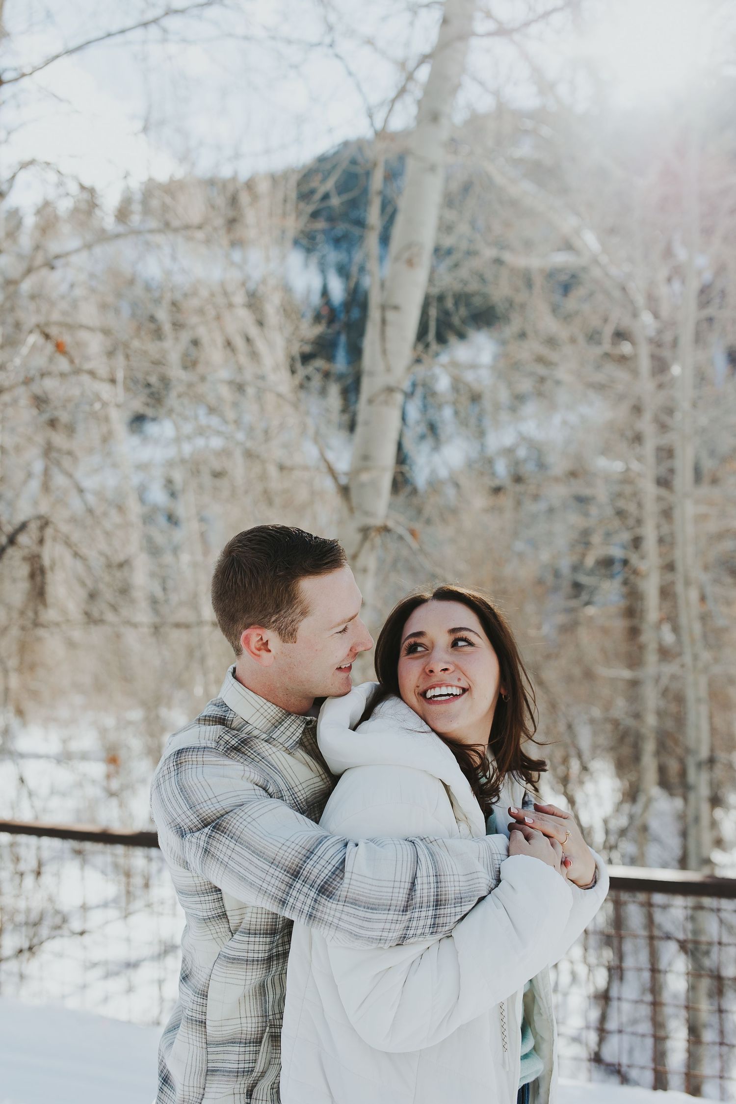 Engaged couple taking engagement photo