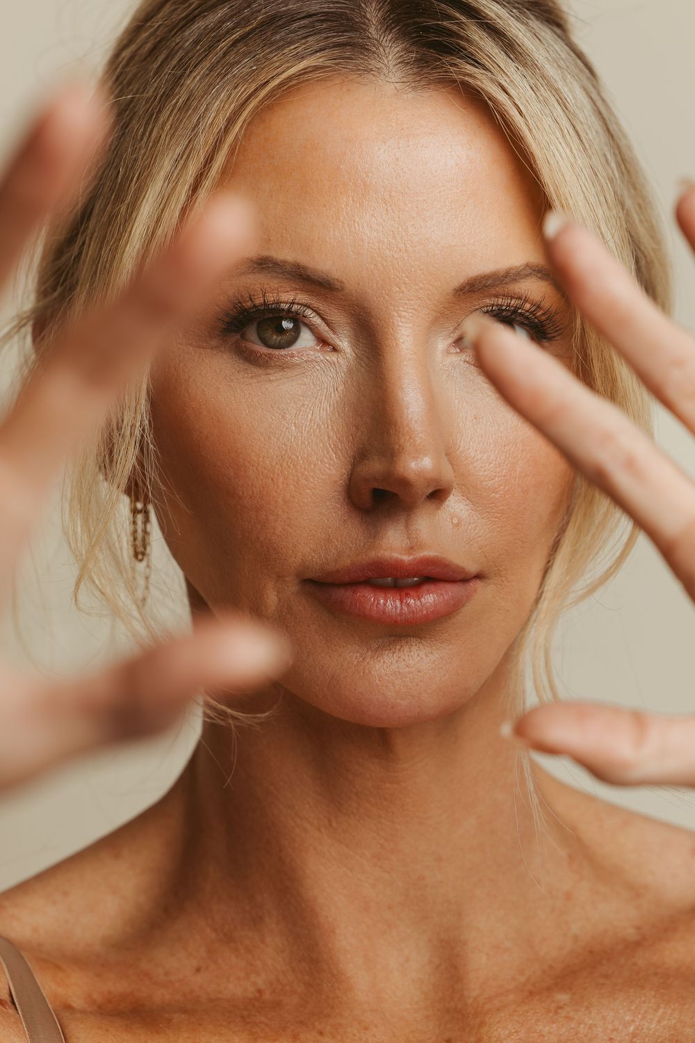 Elegant photo of a woman during a headshot portrait session.