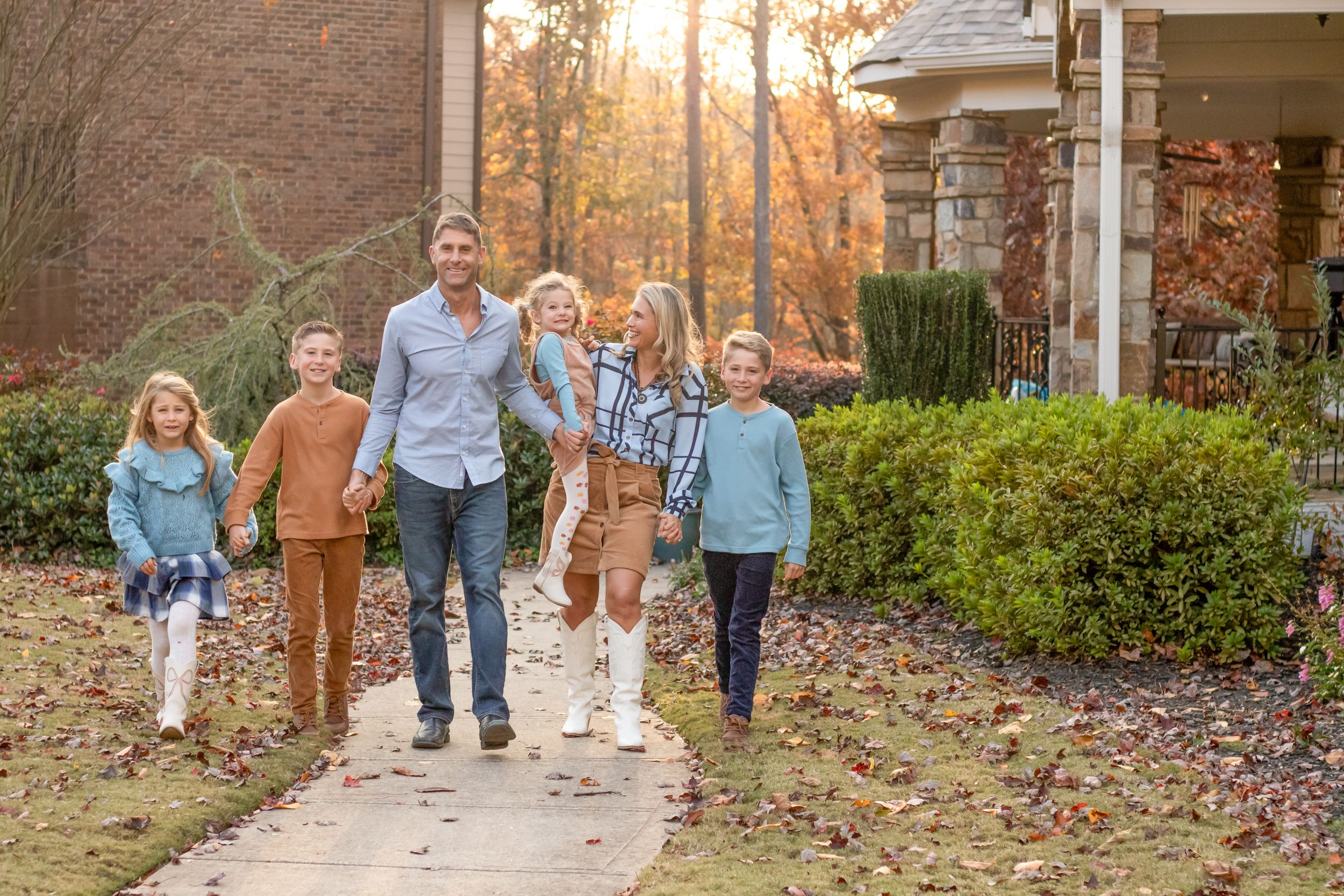 family walking on sidewalk family Acworth, Georgia