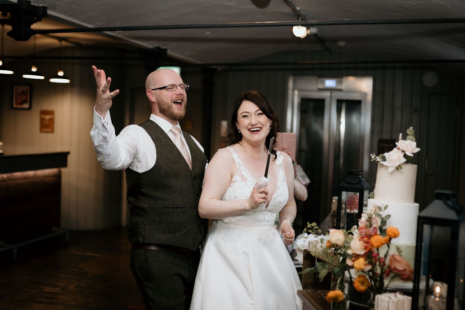 Elegant reception area with exposed beams and rustic charm at The West Mill Derbyshire wedding venue