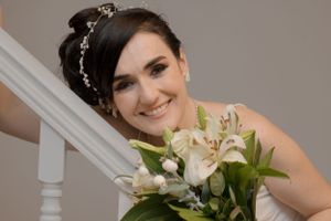 A collection of black and white wedding preparation photos showing joyful moments and emotions.