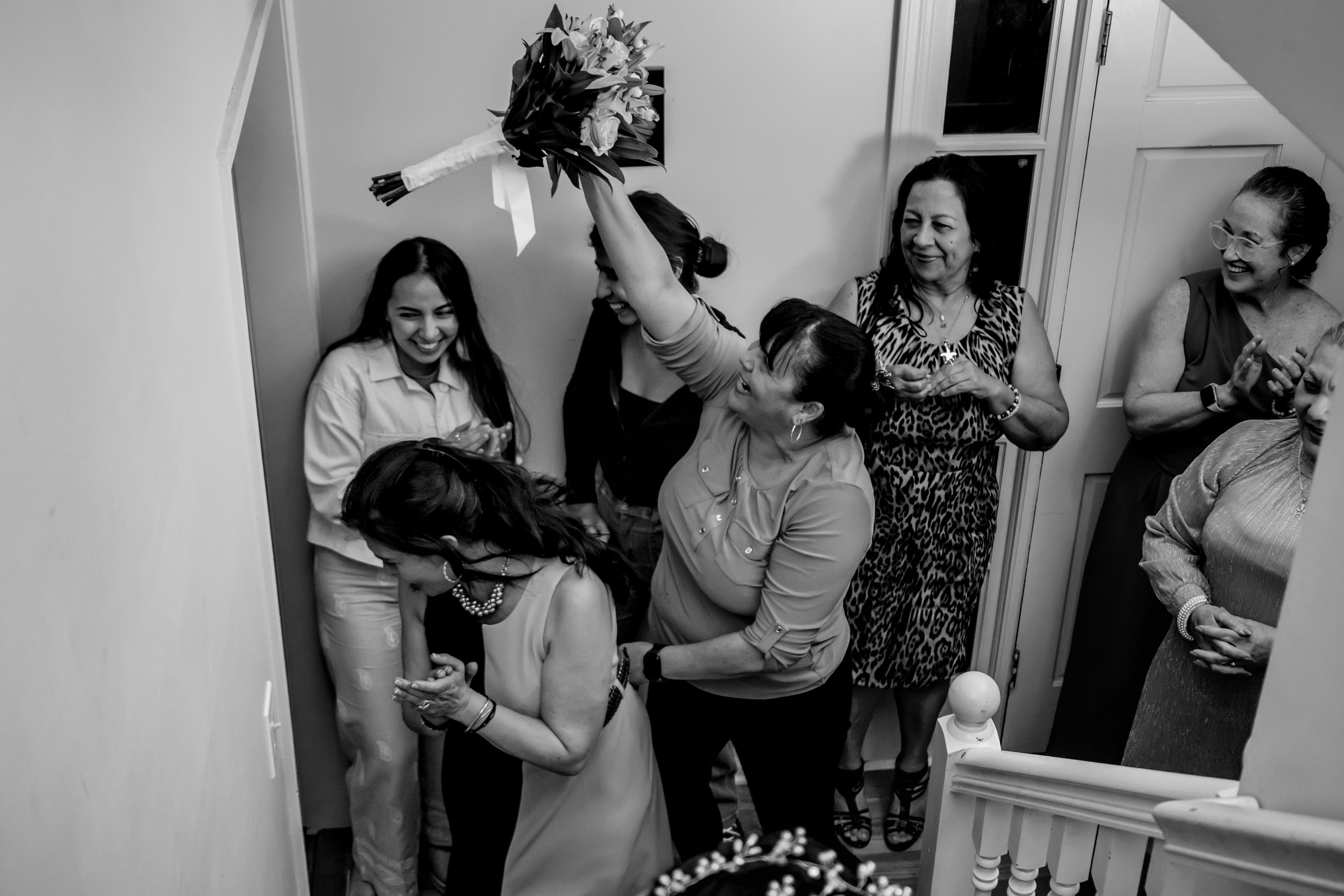 Series of monochrome images showing wedding guests' reactions and celebrations.
