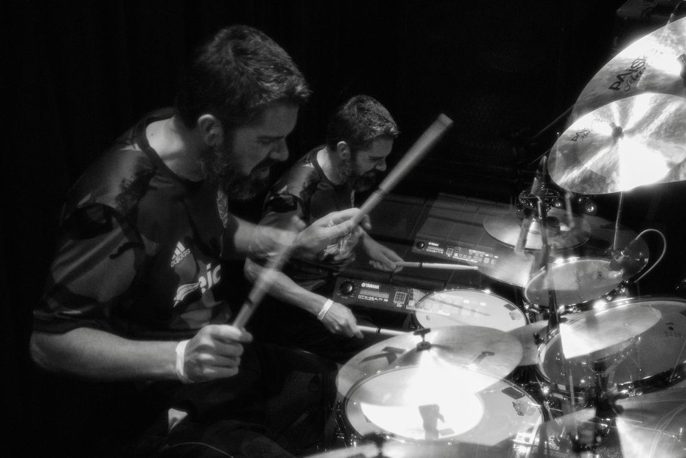 Double exposed image of drummer during live set in Baltimore, Maryland.