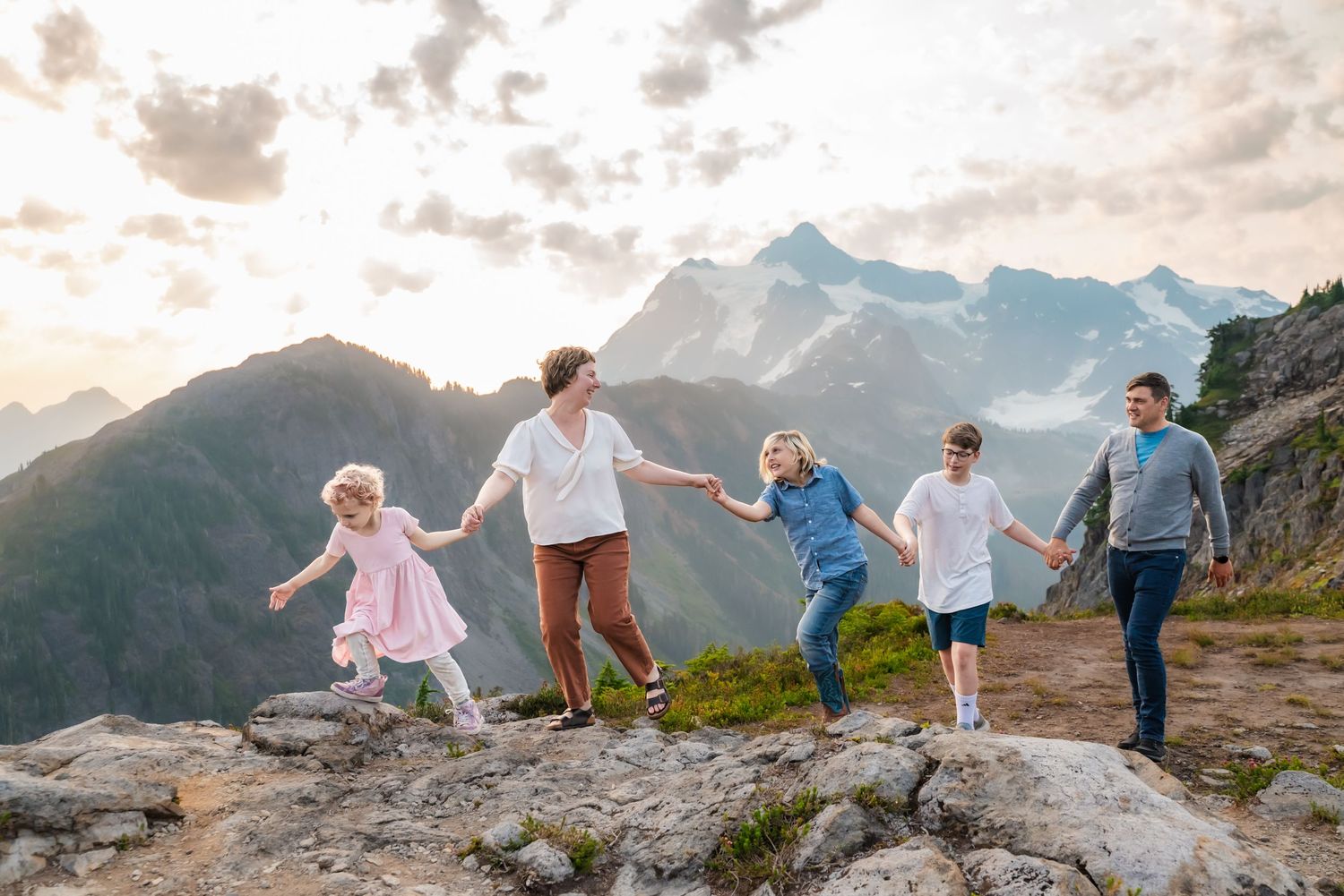 Family plays up on Artist's Point, Mount Baker, for an image with Sound of Music vibes