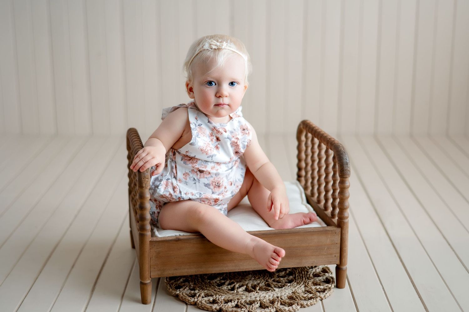 Newly turned one-year-old sitting in a prop before her cake smash - Kalgoorlie Milestone Photographer