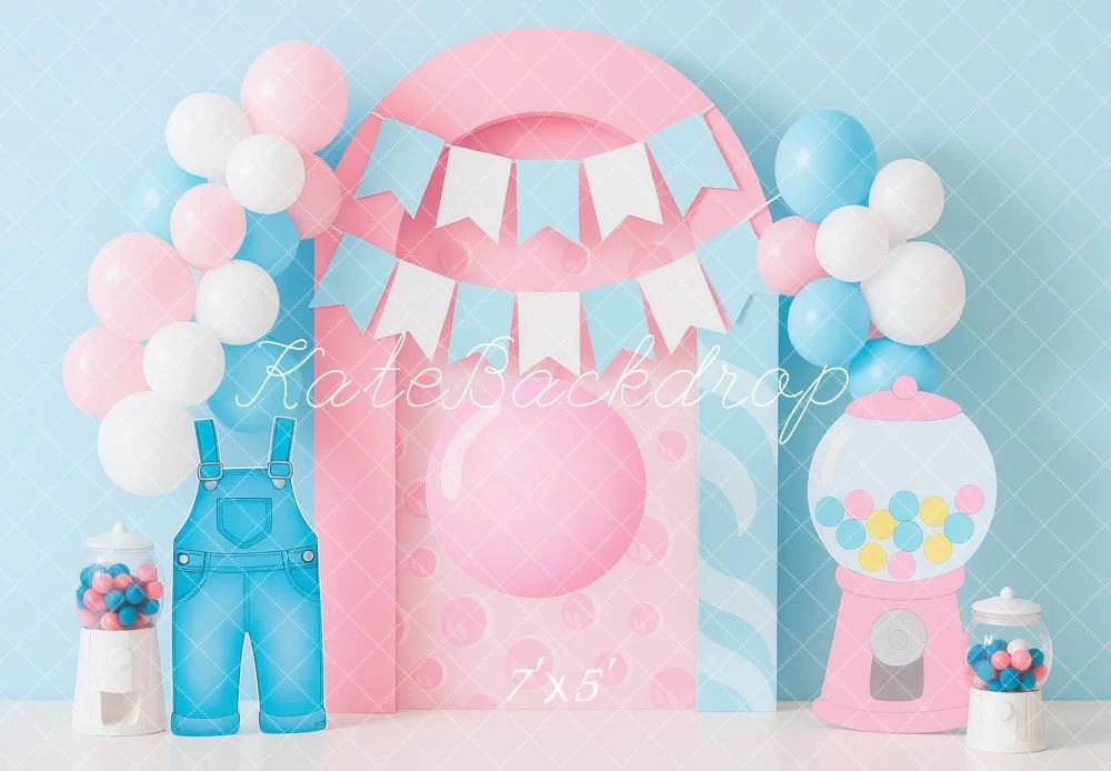Pink and blue party decorations including bunting, balloons, bows and banners arranged in a pastel themed display.