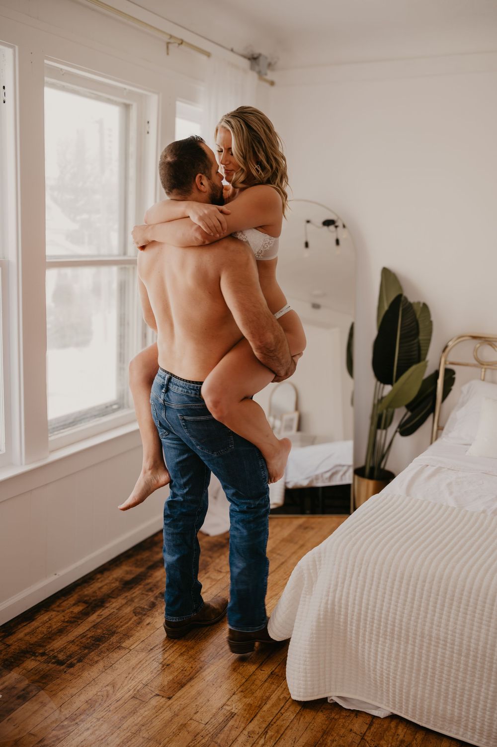 Couples boudoir session with window light