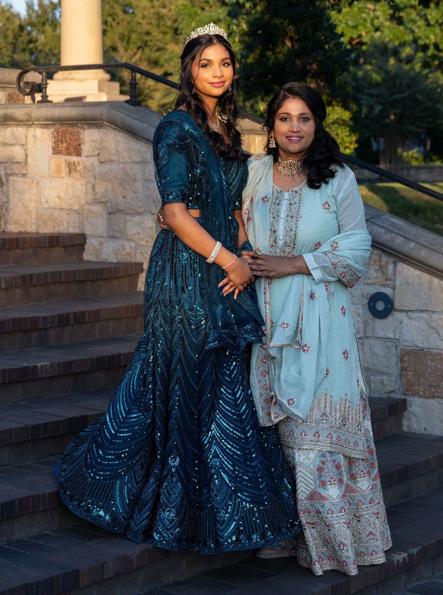Sixteen-year-old girl embracing womanhood during Sweet 16 photoshoot with her mom.