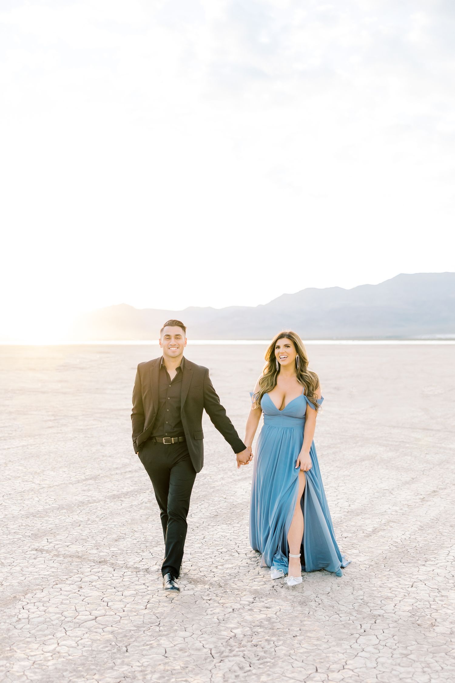 julia stockton las vegas california wedding photographer dry lake engagements blue dress romantic dog engagement photos