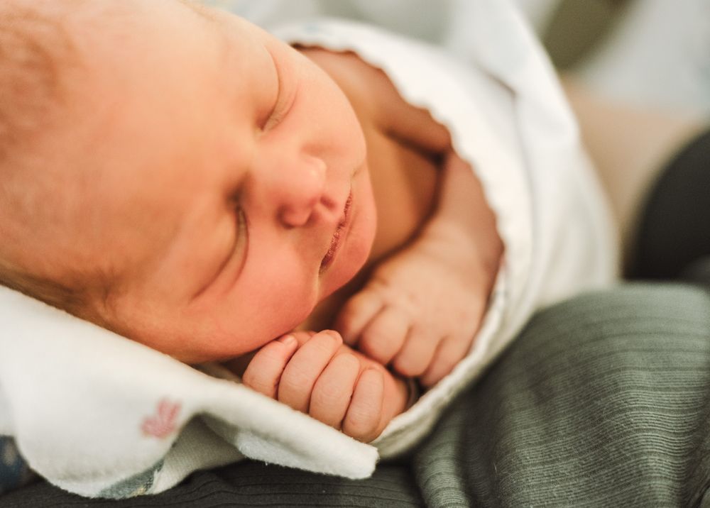 Newborn snuggles in Fresh 48