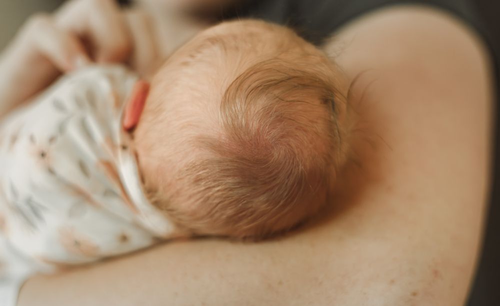Tiny swirls of hair on a newborns head