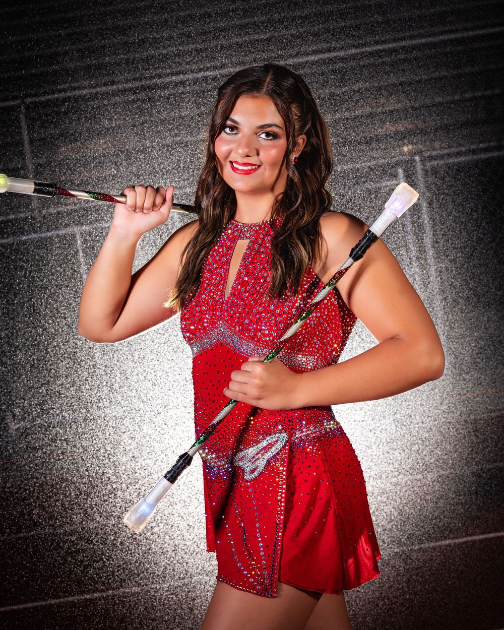 High school majorette senior portrait holding baton – dramatic sports portrait by Pixel House Photography Ohio