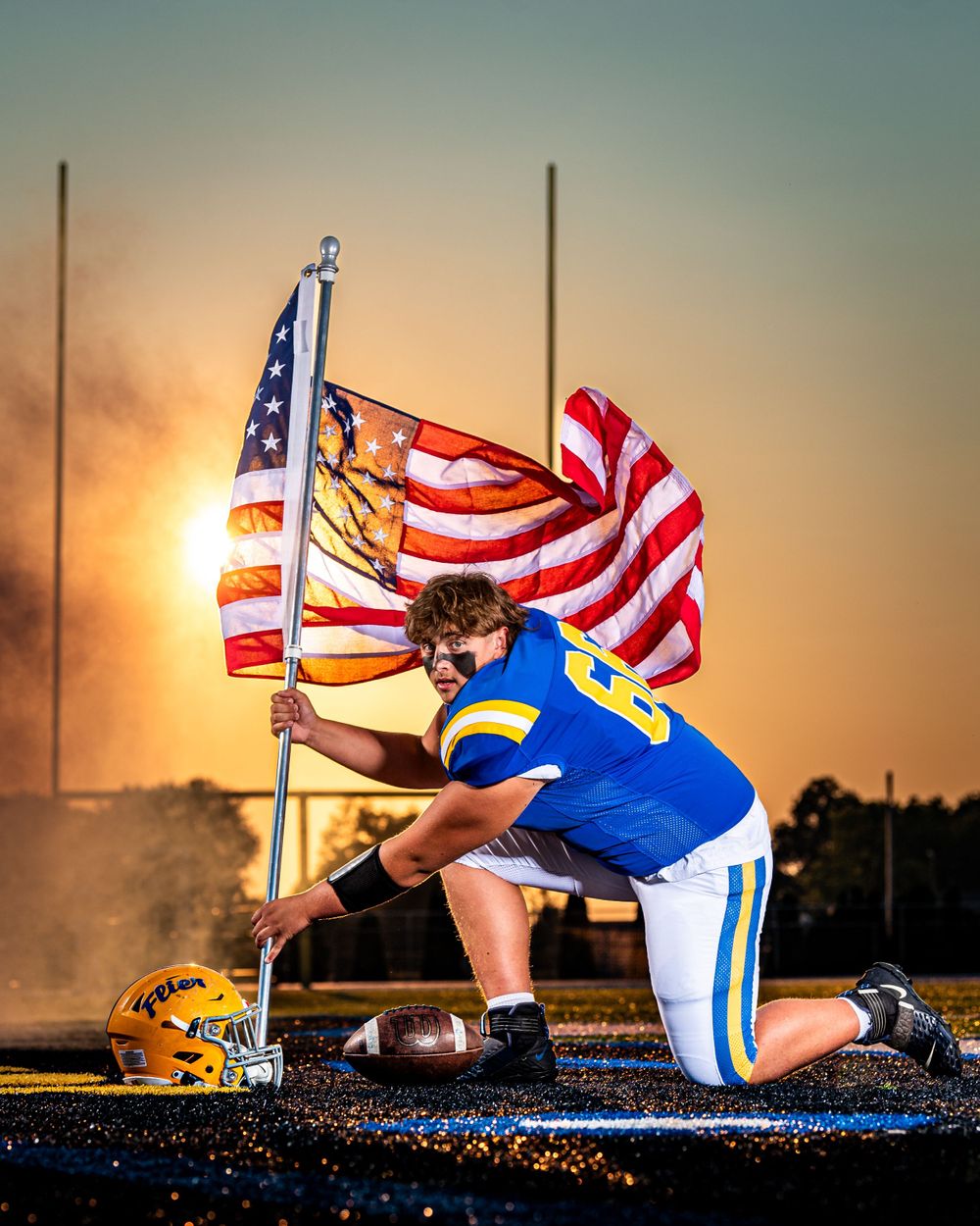 Shot in Clyde, Ohio, this striking image blends artistry with athleticism, perfect for those who want a standout football portrait.