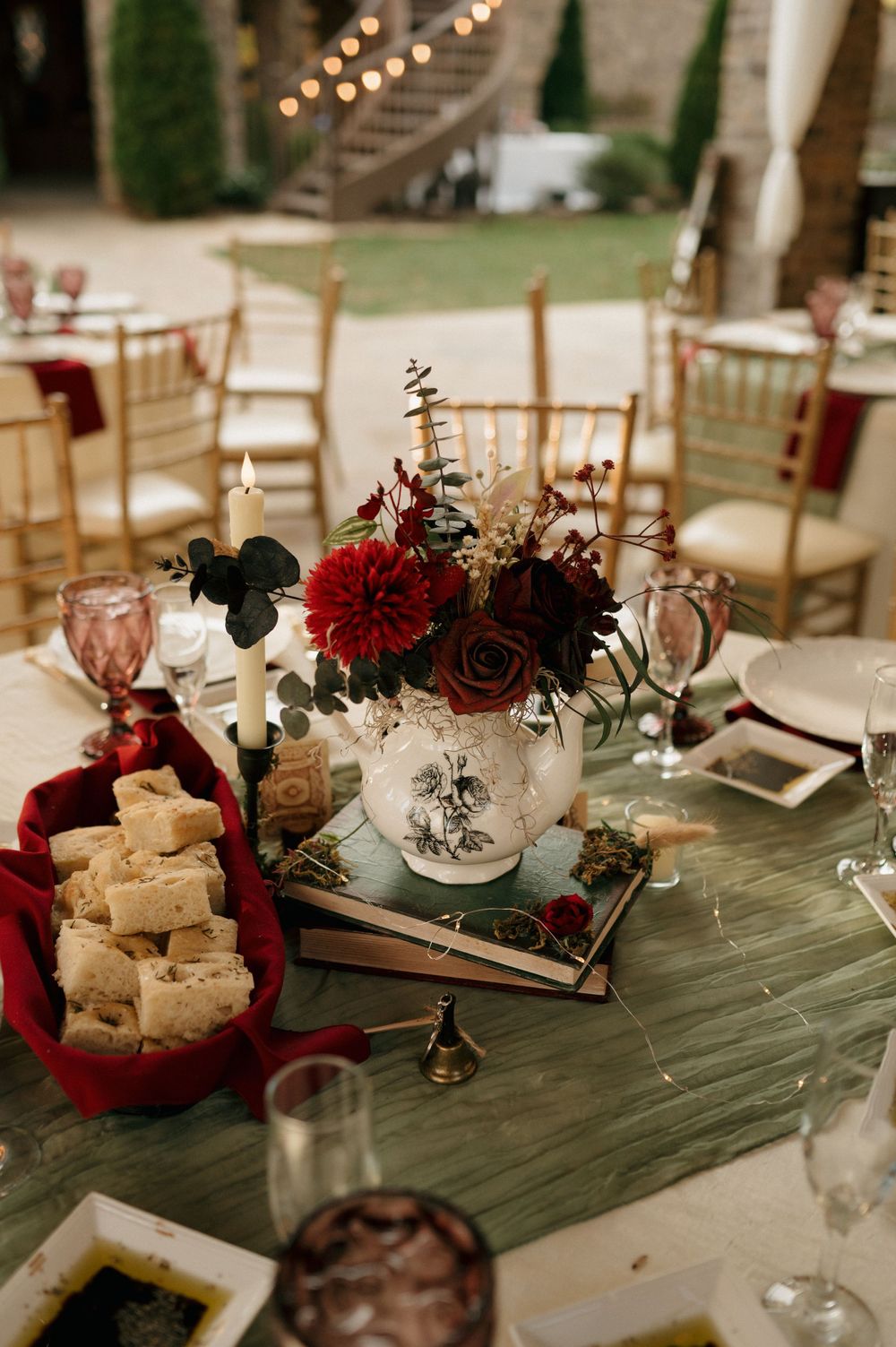 Directional wedding sign post with multiple arrows pointing to different locations.