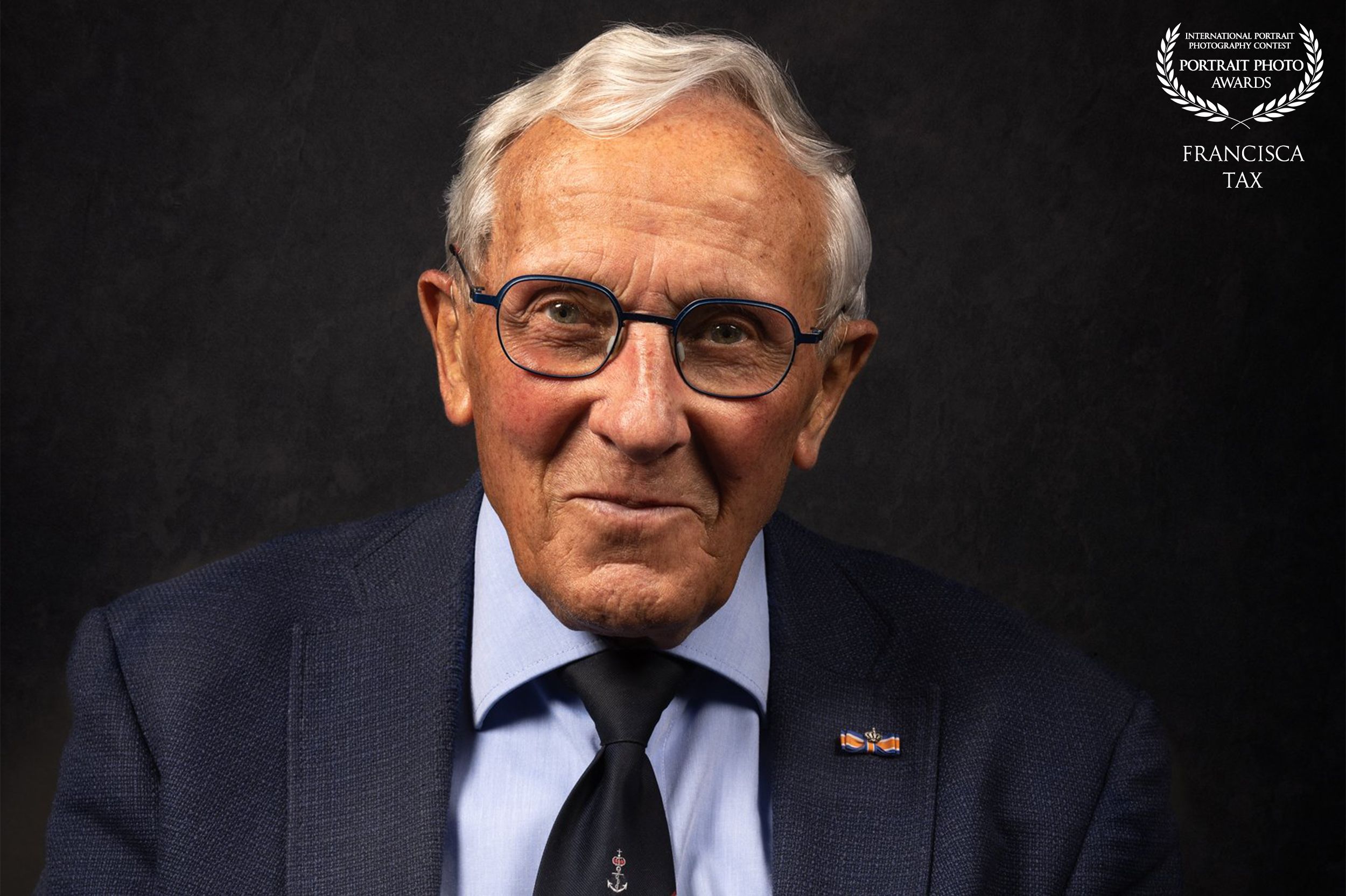 Five profile shots of a person wearing glasses in different poses show varying facial expressions.
