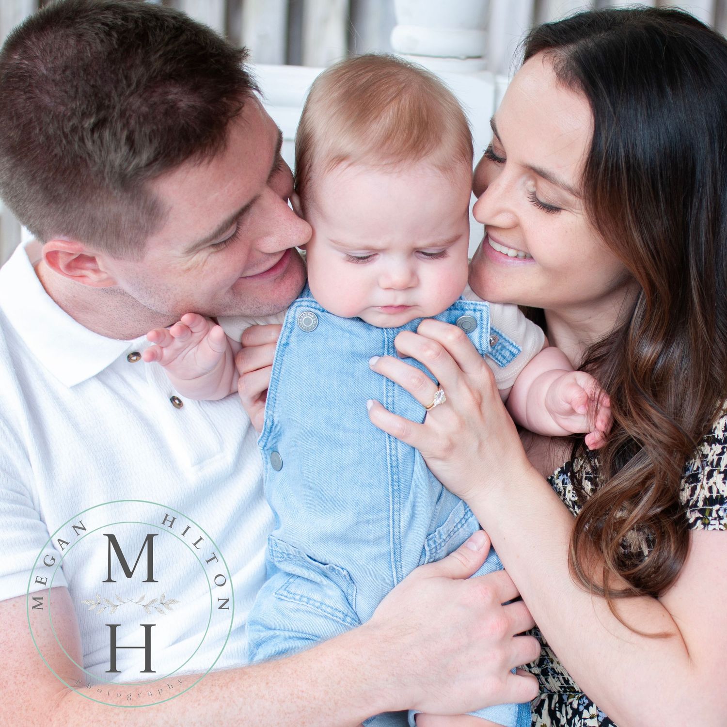 Candid image of family of three
