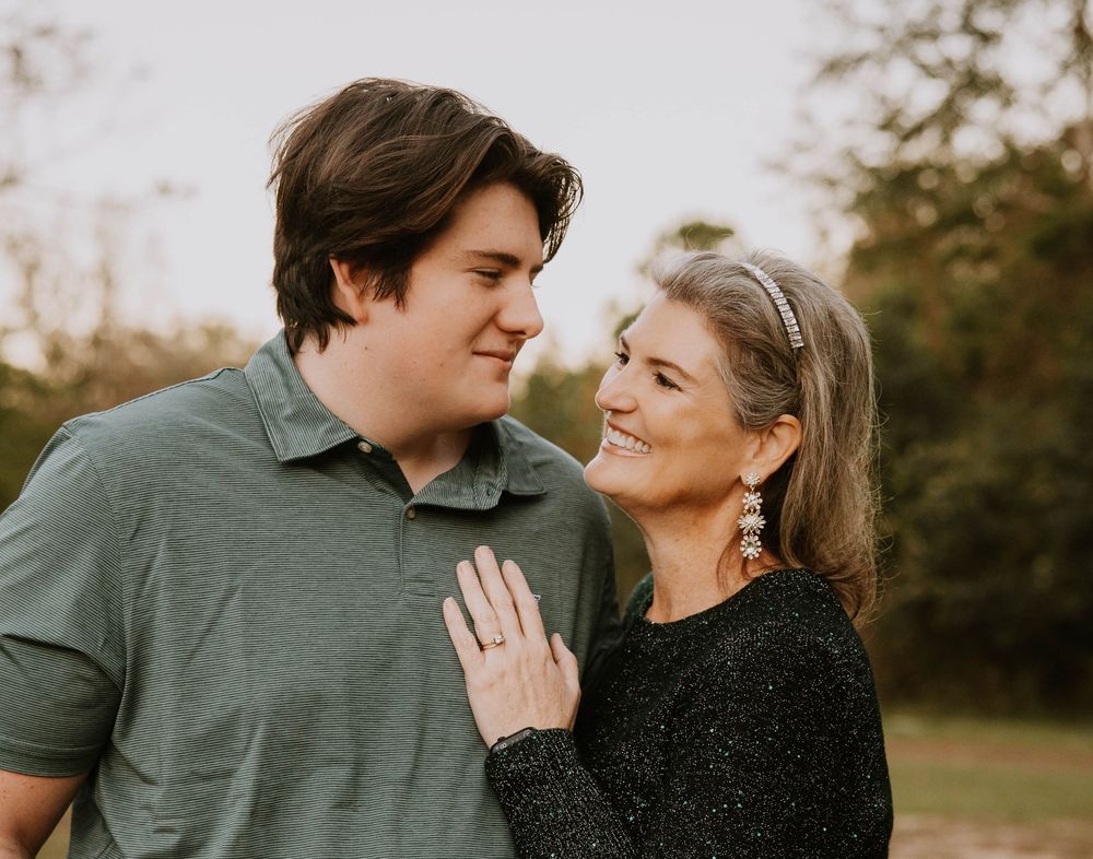 Intimate couple's portrait session showing tender moments in natural lighting.