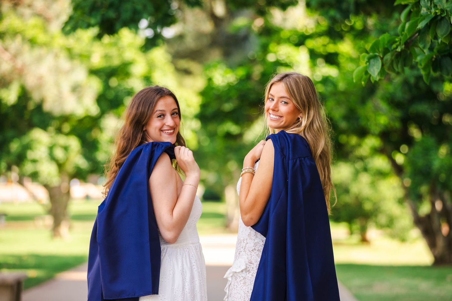 cap and gown of twin girls