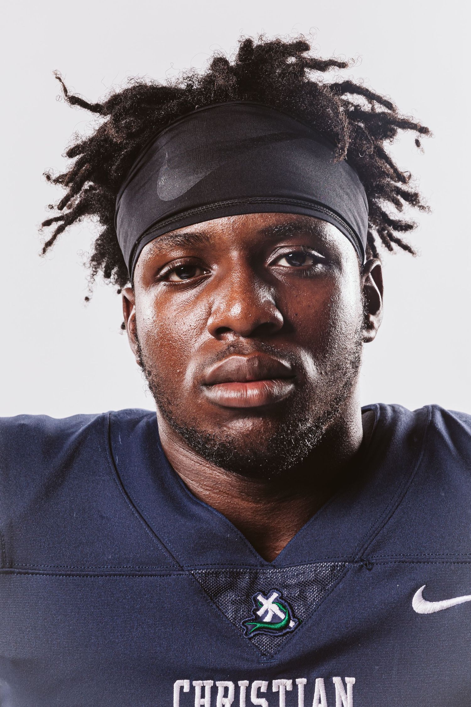 football player portrait on white background