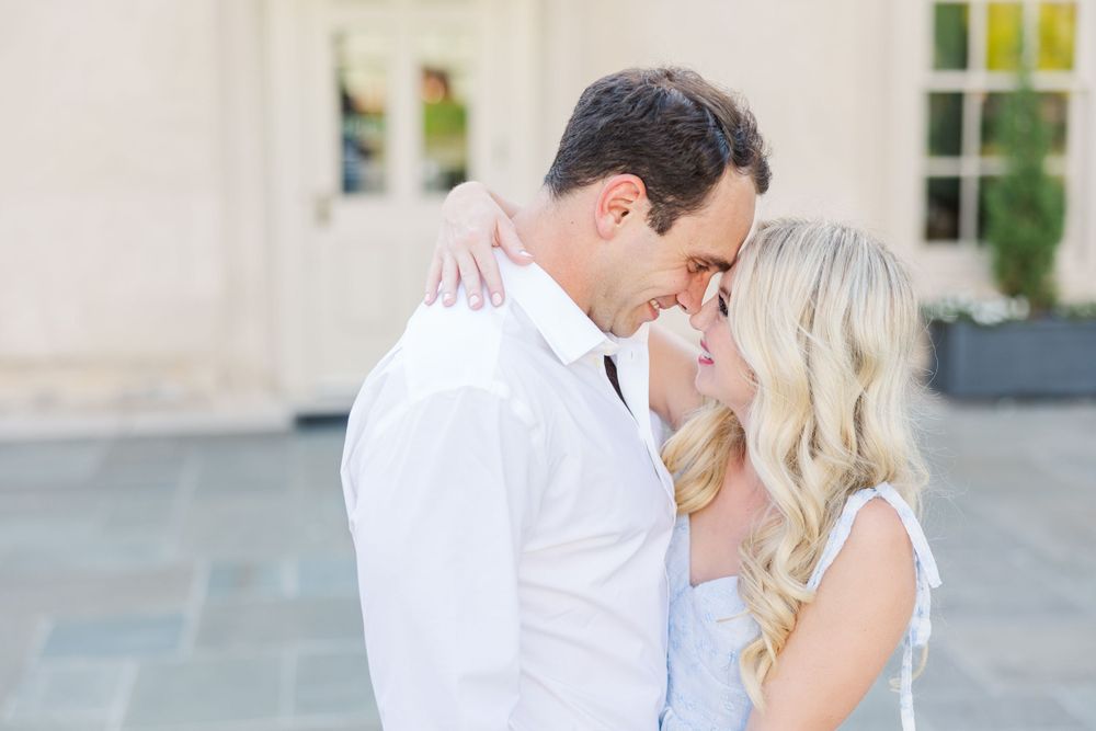 An intimate moment between a couple during their engagement photo session.