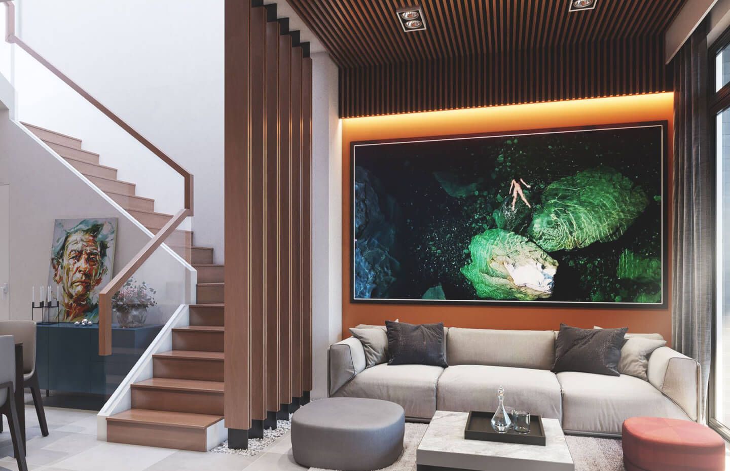 Modern living room with wooden accent wall, gray sofa, and large underwater photography display.