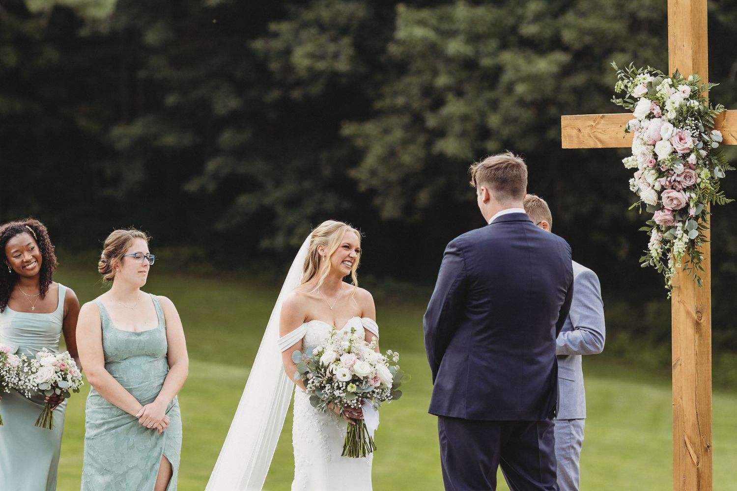 Top Maine Wedding Photographer capturing wedding day at Waters Edge location in Central Maine