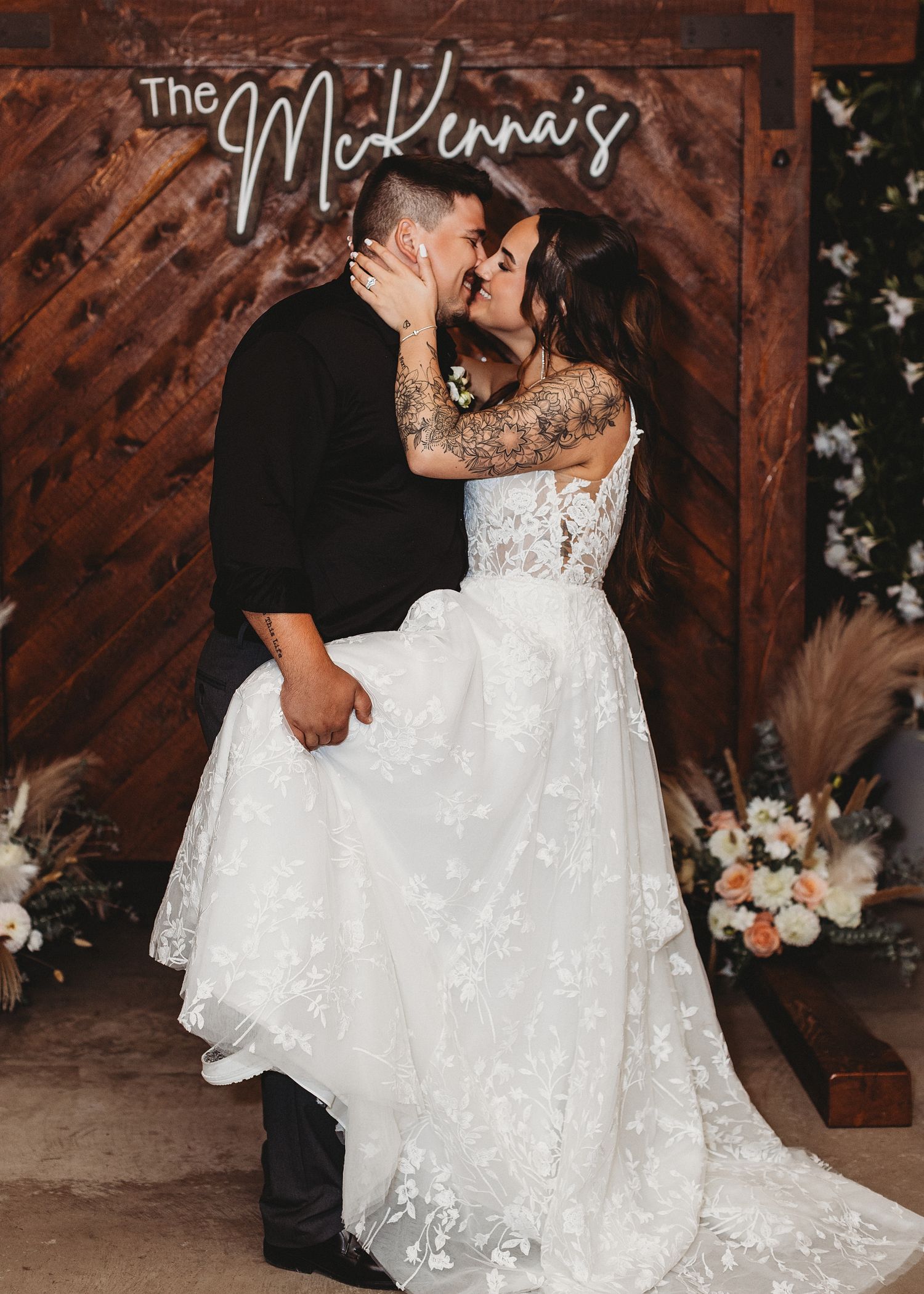 couples kissing on their wedding day in maine
