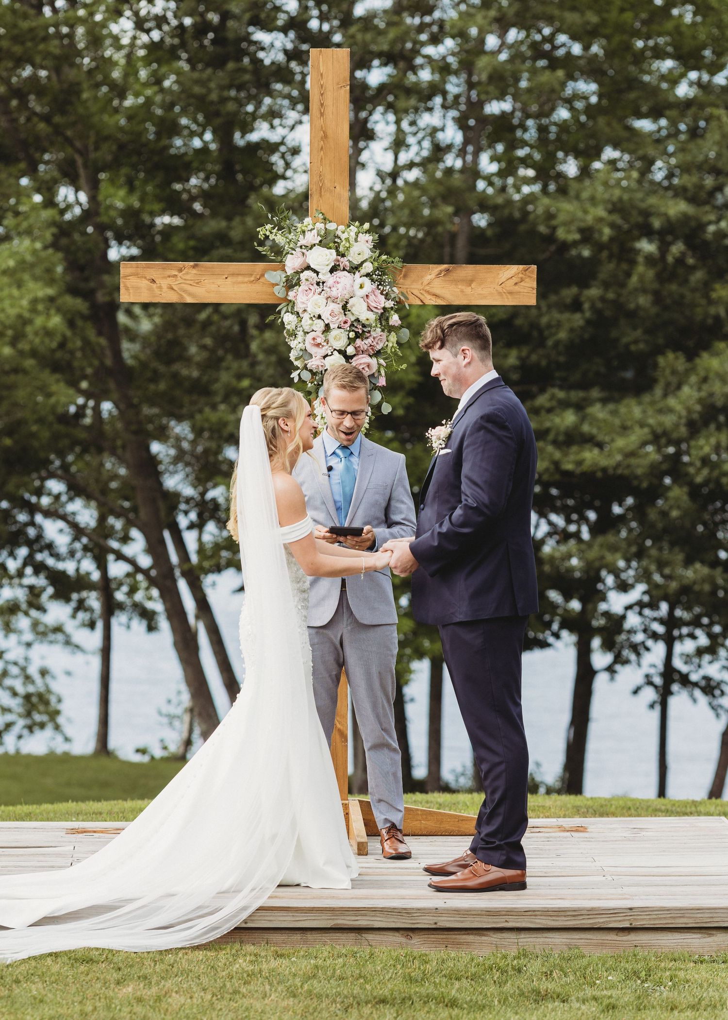 Best Maine Wedding Photographer capturing wedding day at Waters Edge location in Central Maine