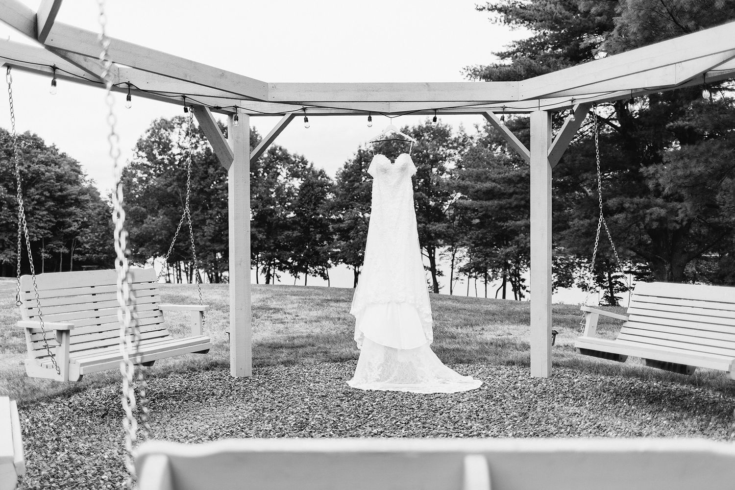 maine wedding photographer capturing lakeside ceremony at maine wedding venue with photos of bridal couple