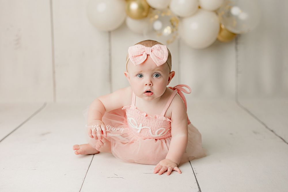 baby girl in pink studio session