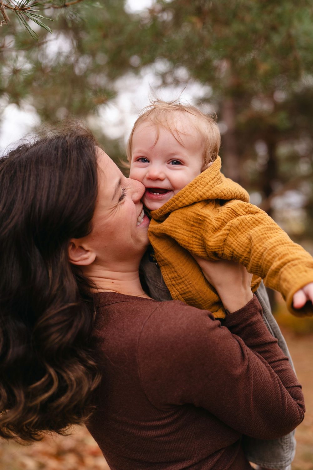 A series of joyful moments captured between parent and child in matching brown and mustard yellow outfits.