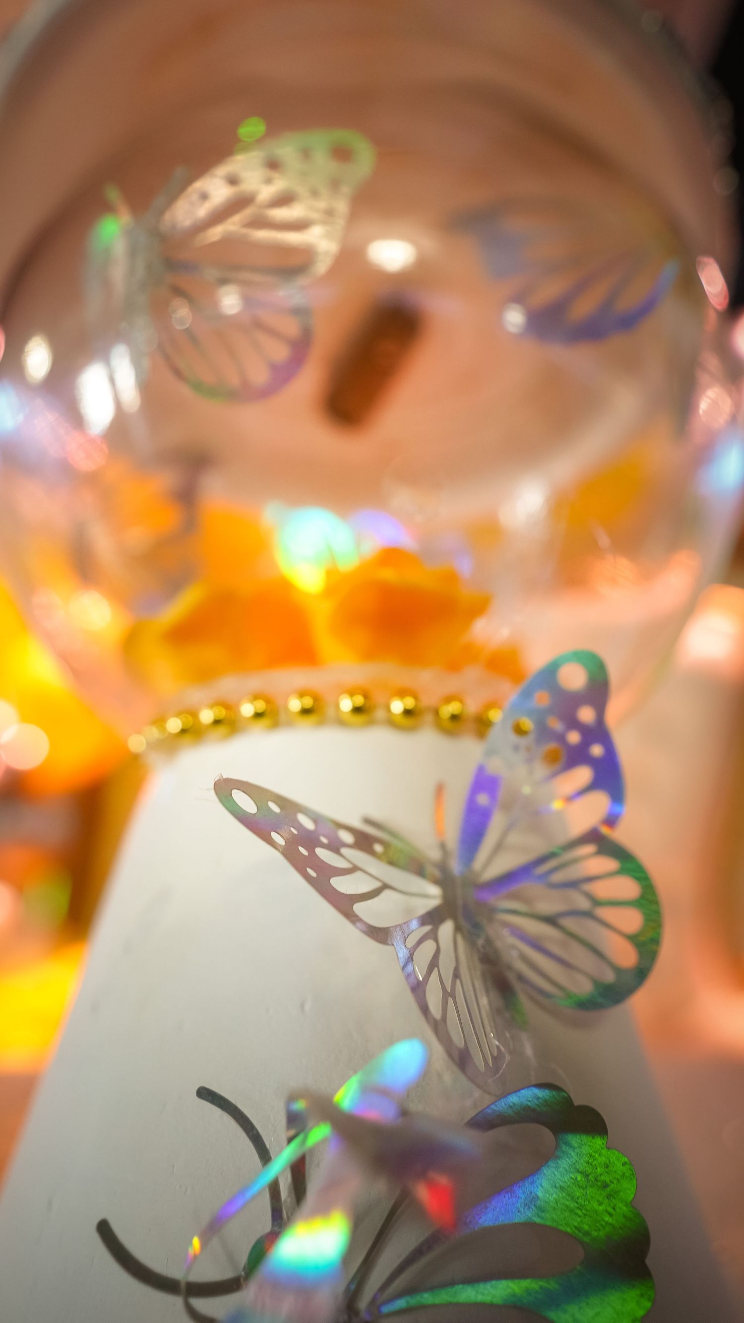 Butterfly inspired Quinceañera decorations symbolizing hope courage and transformation during Briana's unforgettable celebration today.
