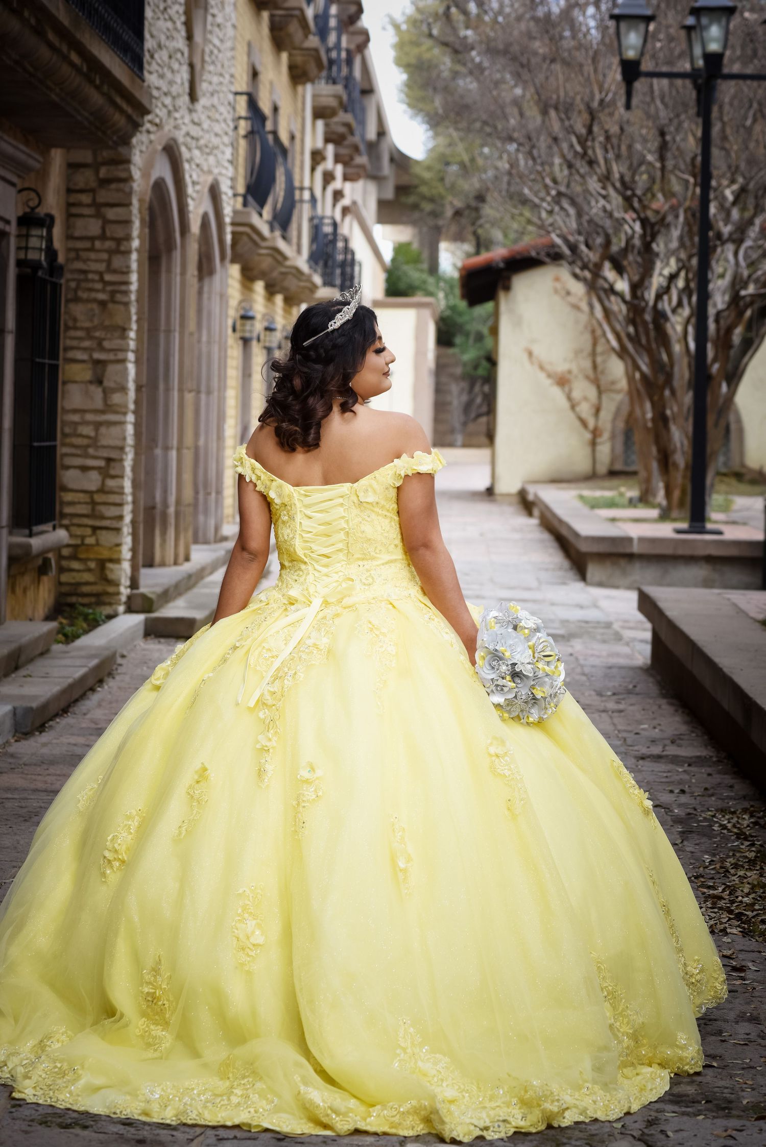 A Wish with Wings Quinceañera celebration photographed by trusted Dallas Fort Worth Quinceañera photographer at Las Colinas Canals.