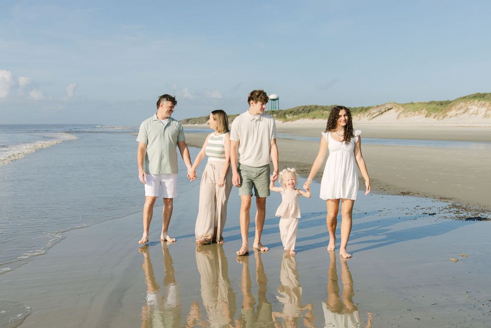 Family of five together on the beach during a Jekyll Island family photography session.