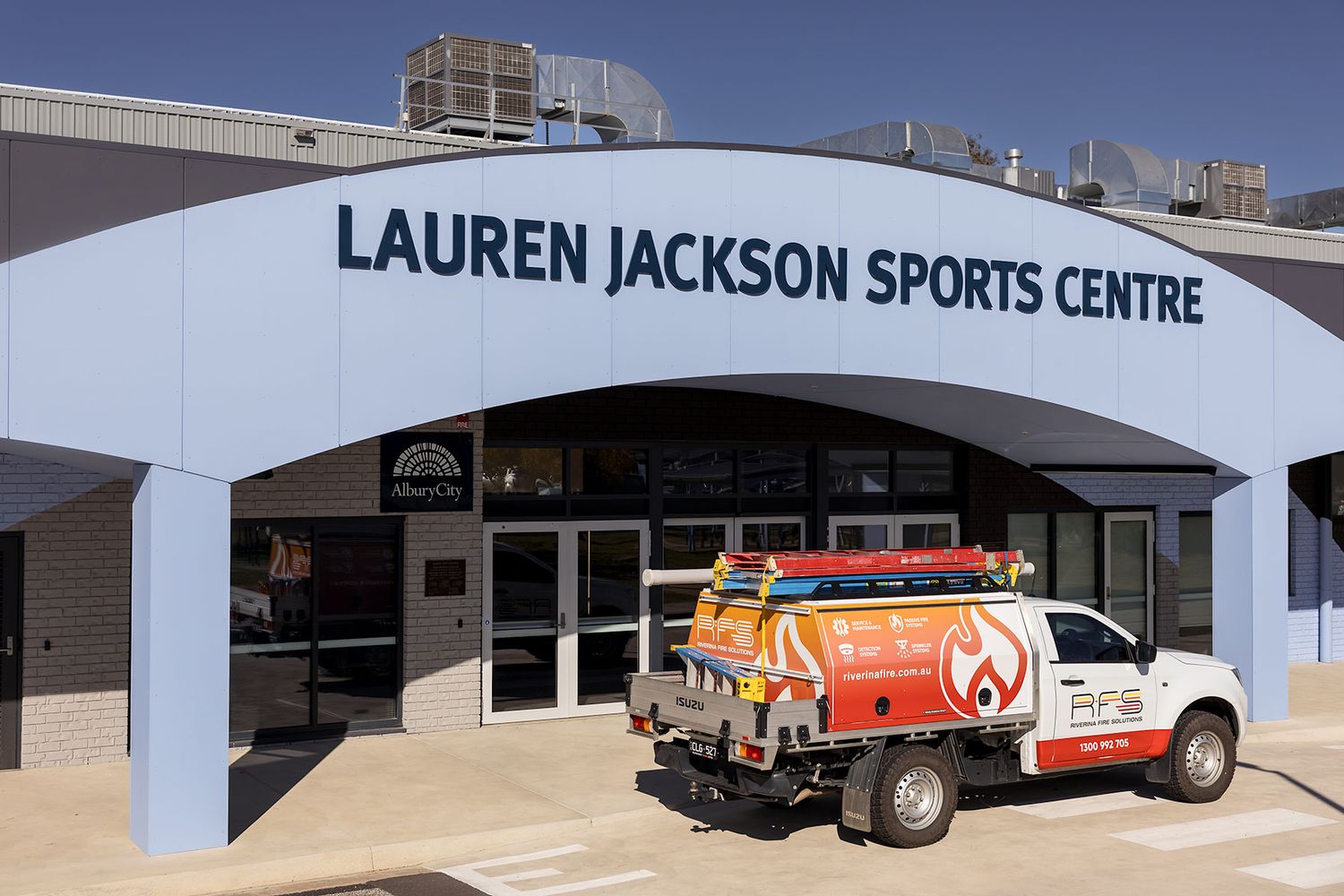 Lauren Jackson Sports Centre entrance with a fire service truck parked outside in Wodonga, Australia.