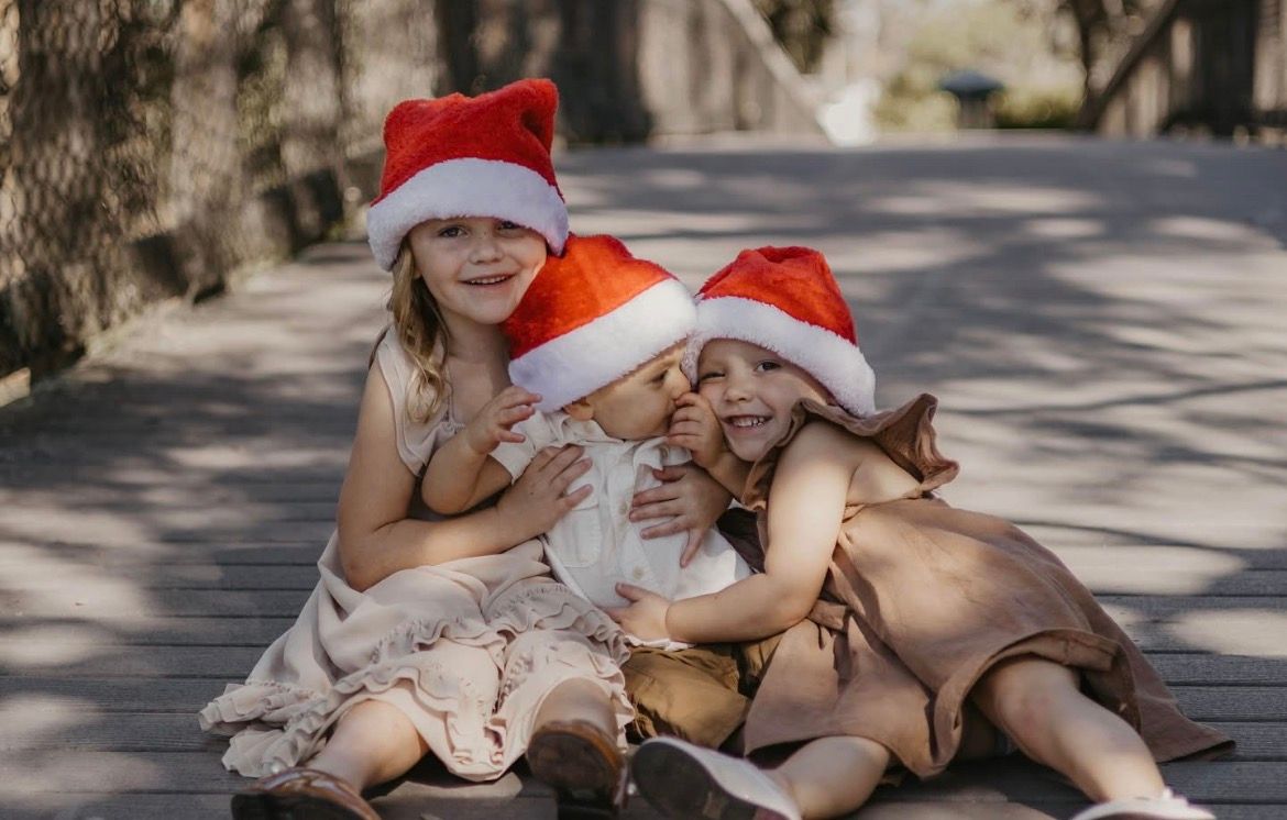 kids on a bridge cuddles close