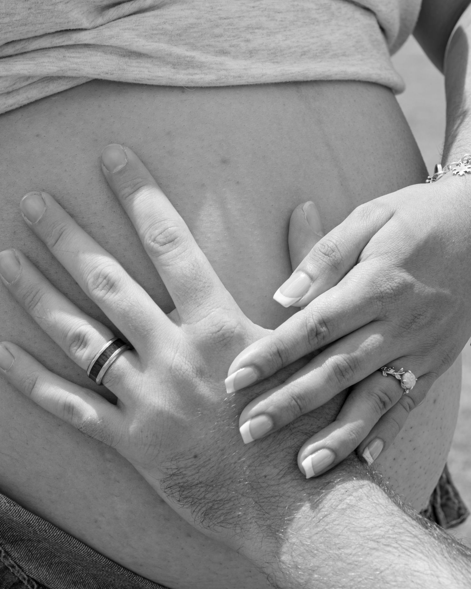Close up Maternity session of holding bump in Austin,TX.