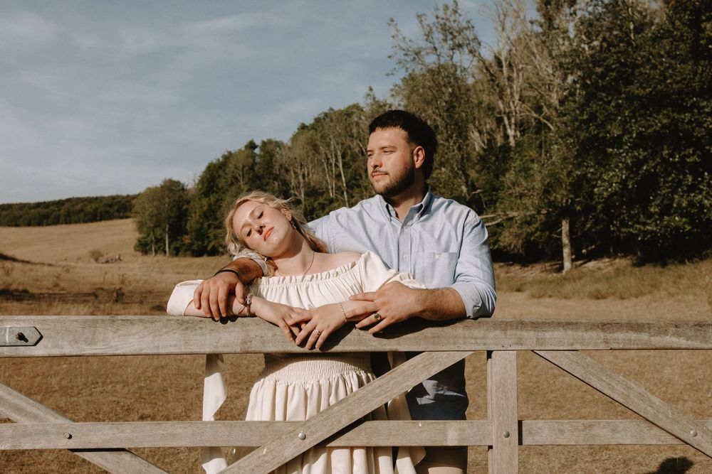 Couple relaxed by gate