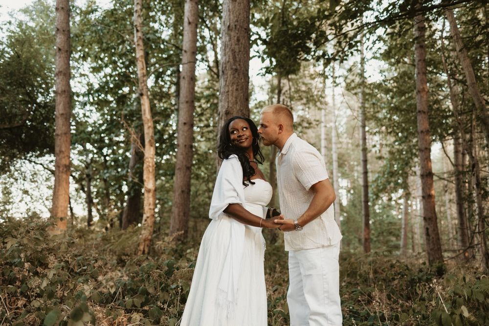Couple leaning in for kiss engagement shoot