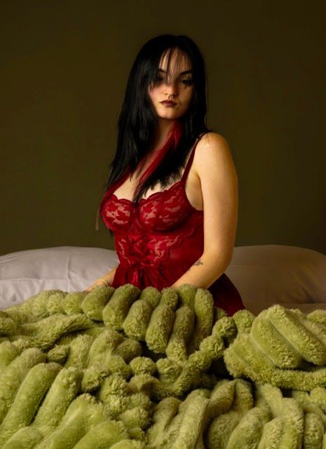 Woman posing during an empowering studio boudoir photography session in Fayetteville NC