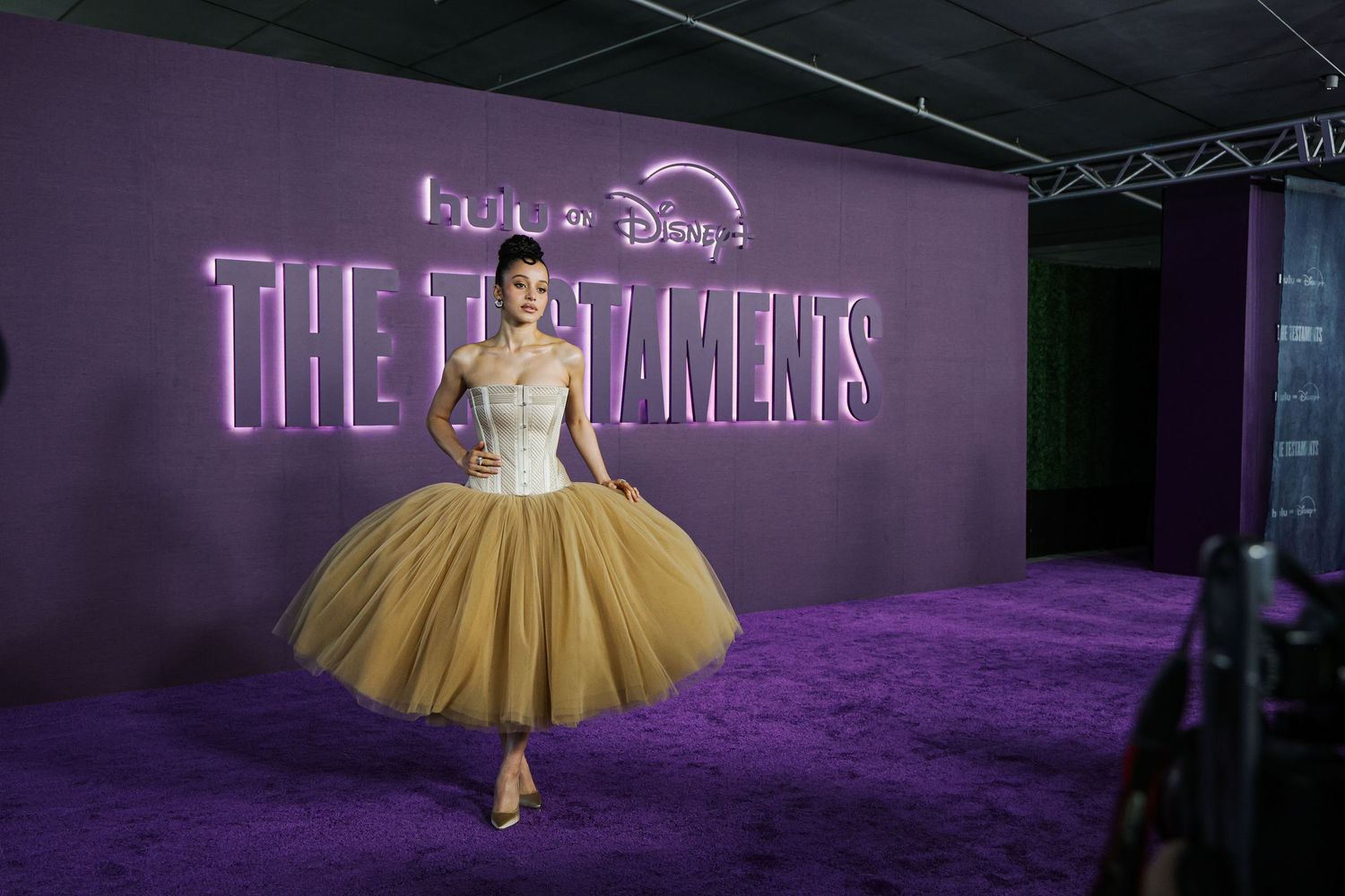 Chase Infiniti at the Los Angeles premiere of Hulu's The Testaments held at the Academy Museum of Motion Pictures.