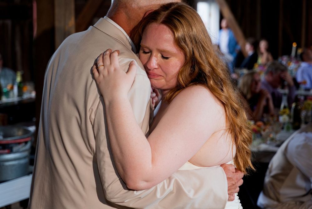 A tearful father-daughter dance in a century-old barn reception.