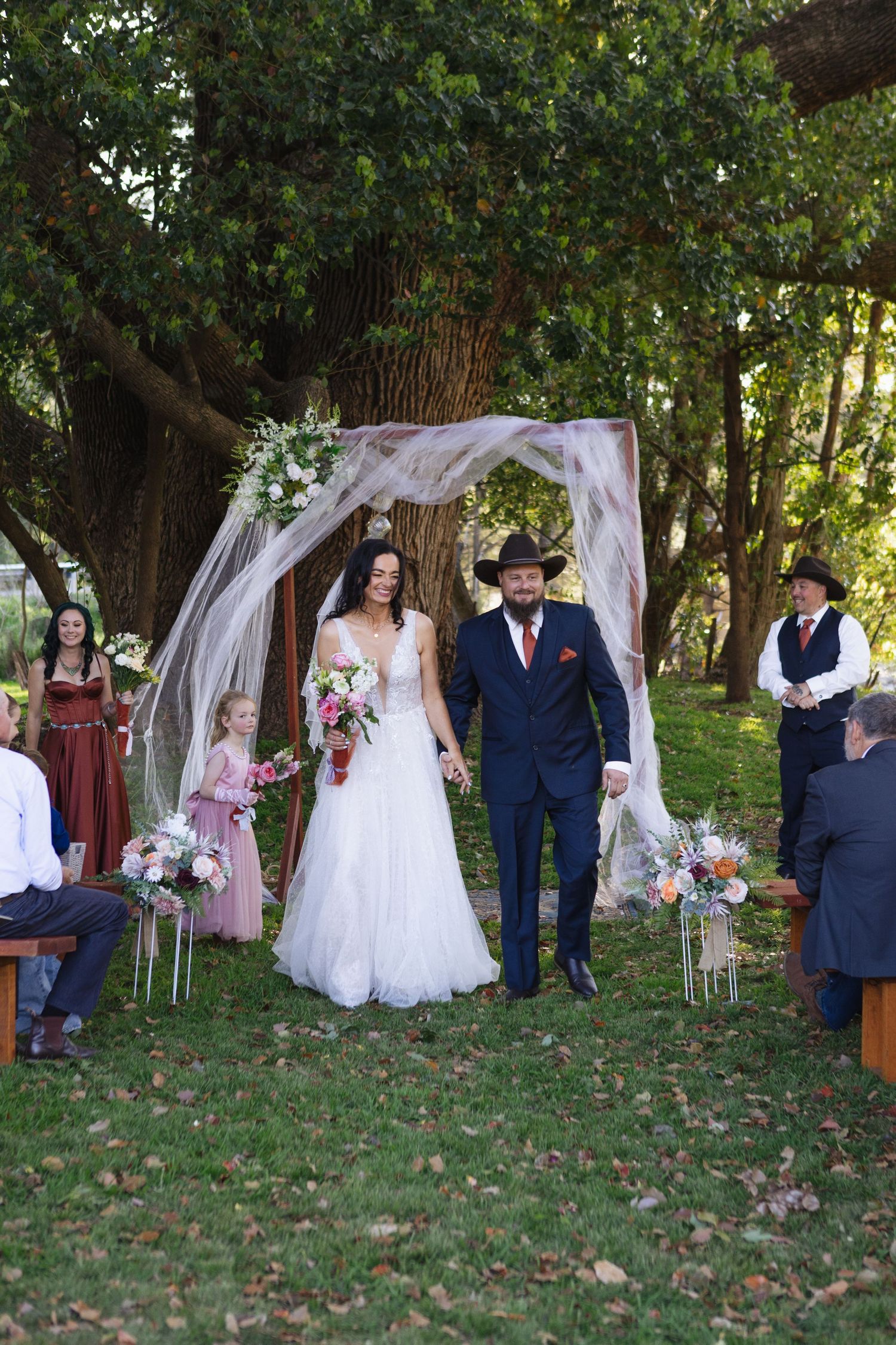 Kylie and Jono’s wedding ceremony beneath an oak tree at Moonan Cottage near Scone NSW