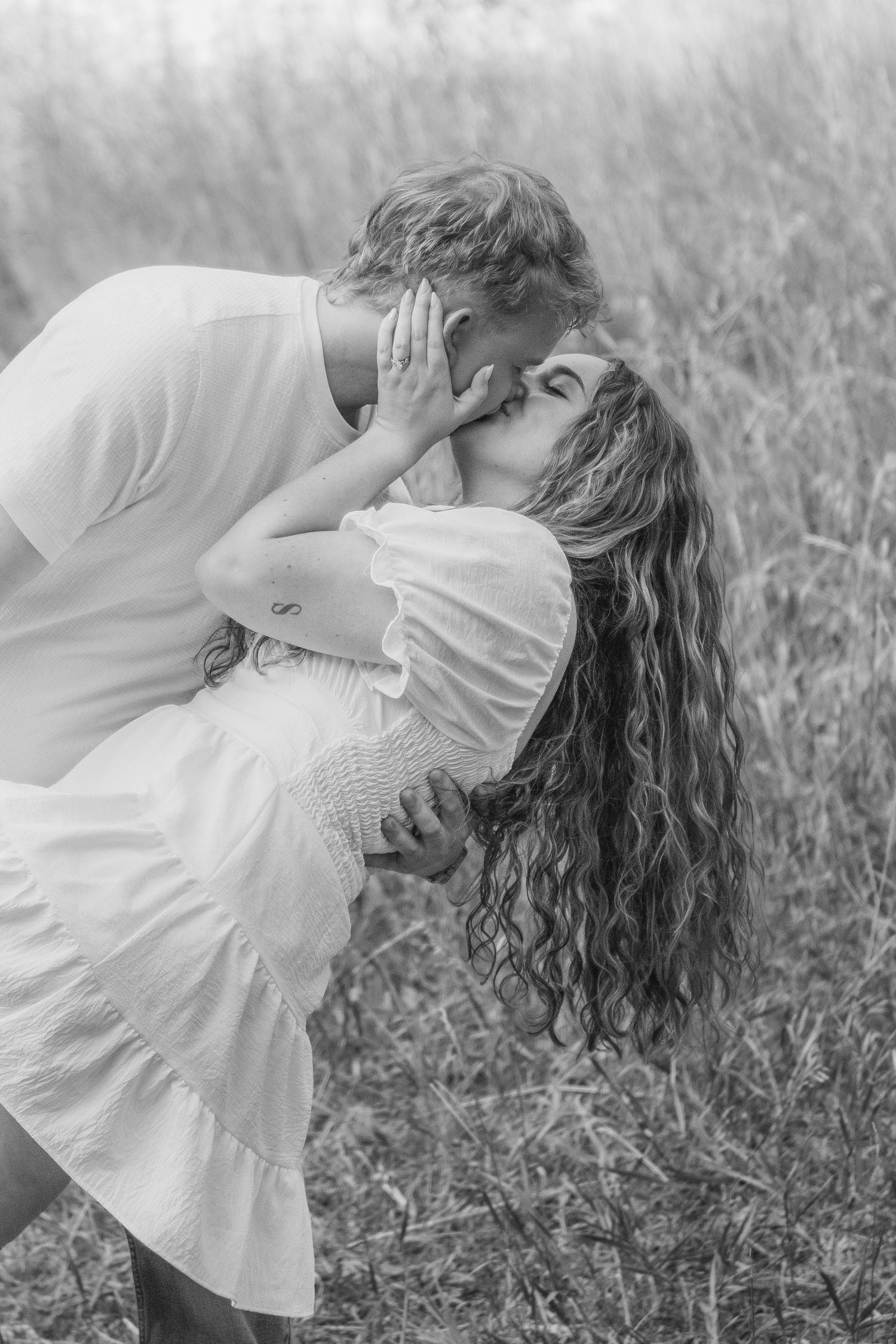 Couple kissing for an engagement session in Northern Utah