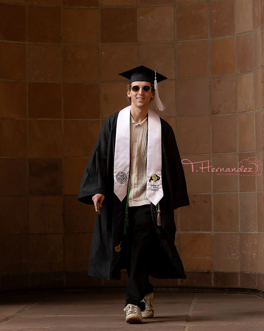 CU Boulder & South Carolina graduation photographer specializing in senior portraits, cap-and-gown photos, and college grad sessions.