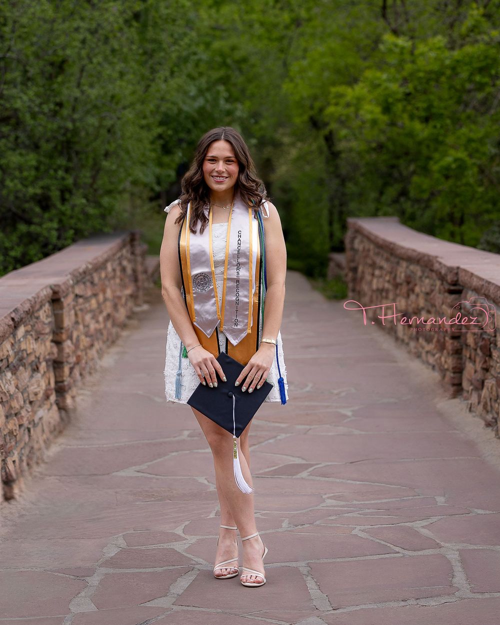 CU Boulder & South Carolina graduation photographer specializing in senior portraits, cap-and-gown photos, and college grad sessions.