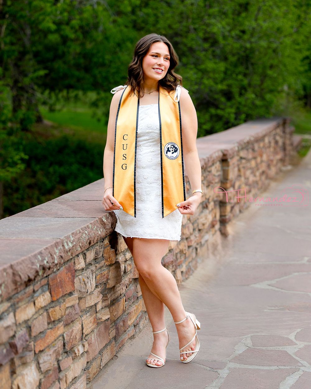 CU Boulder & South Carolina graduation photographer specializing in senior portraits, cap-and-gown photos, and college grad sessions.